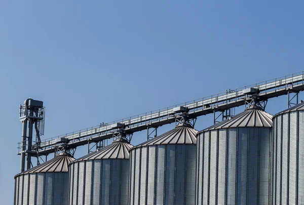 depositphotos_44633357-stock-photo-silos-in-a-warehouse
